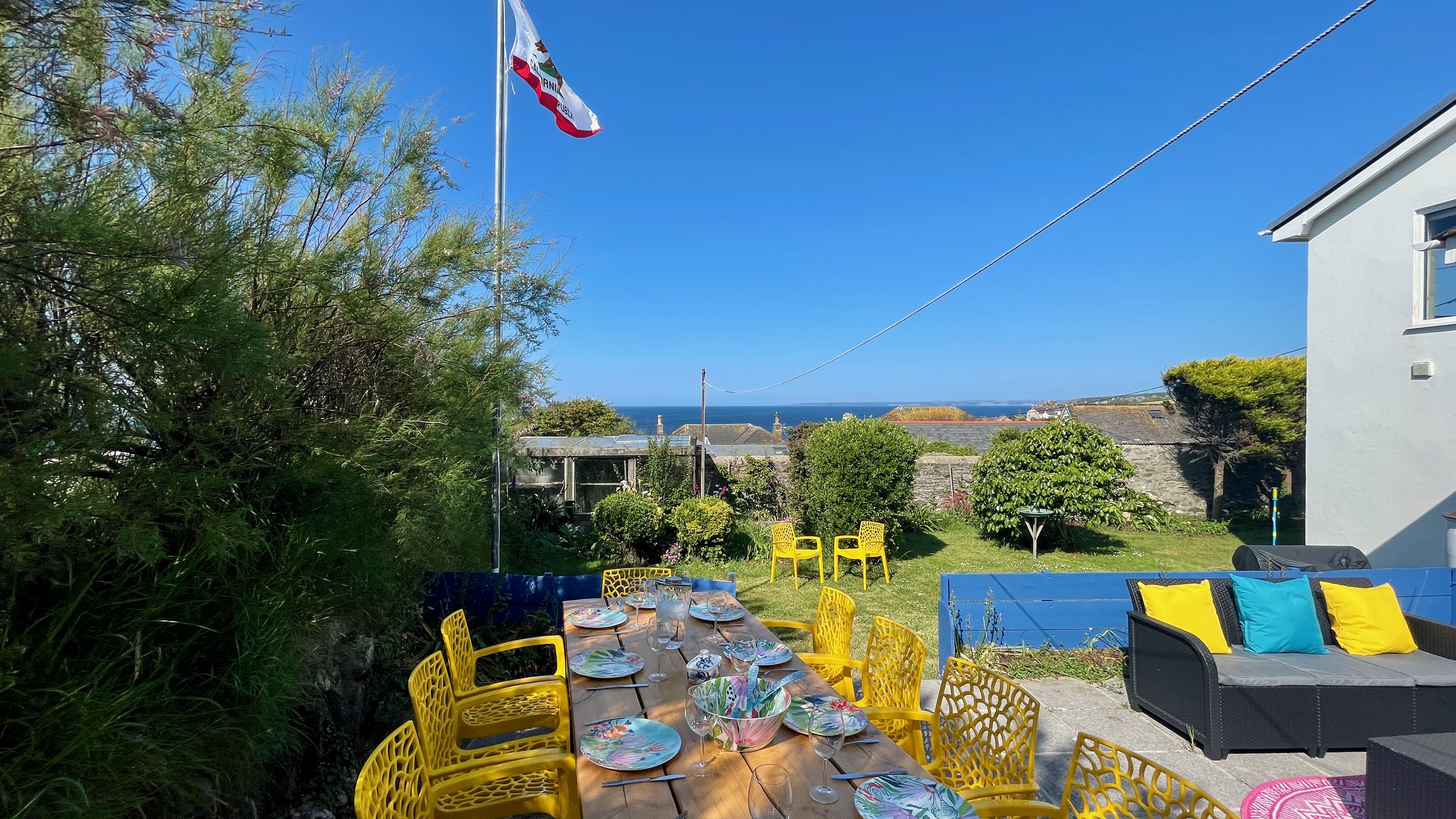 10 seat outside table, garden and large sitting area with sea views