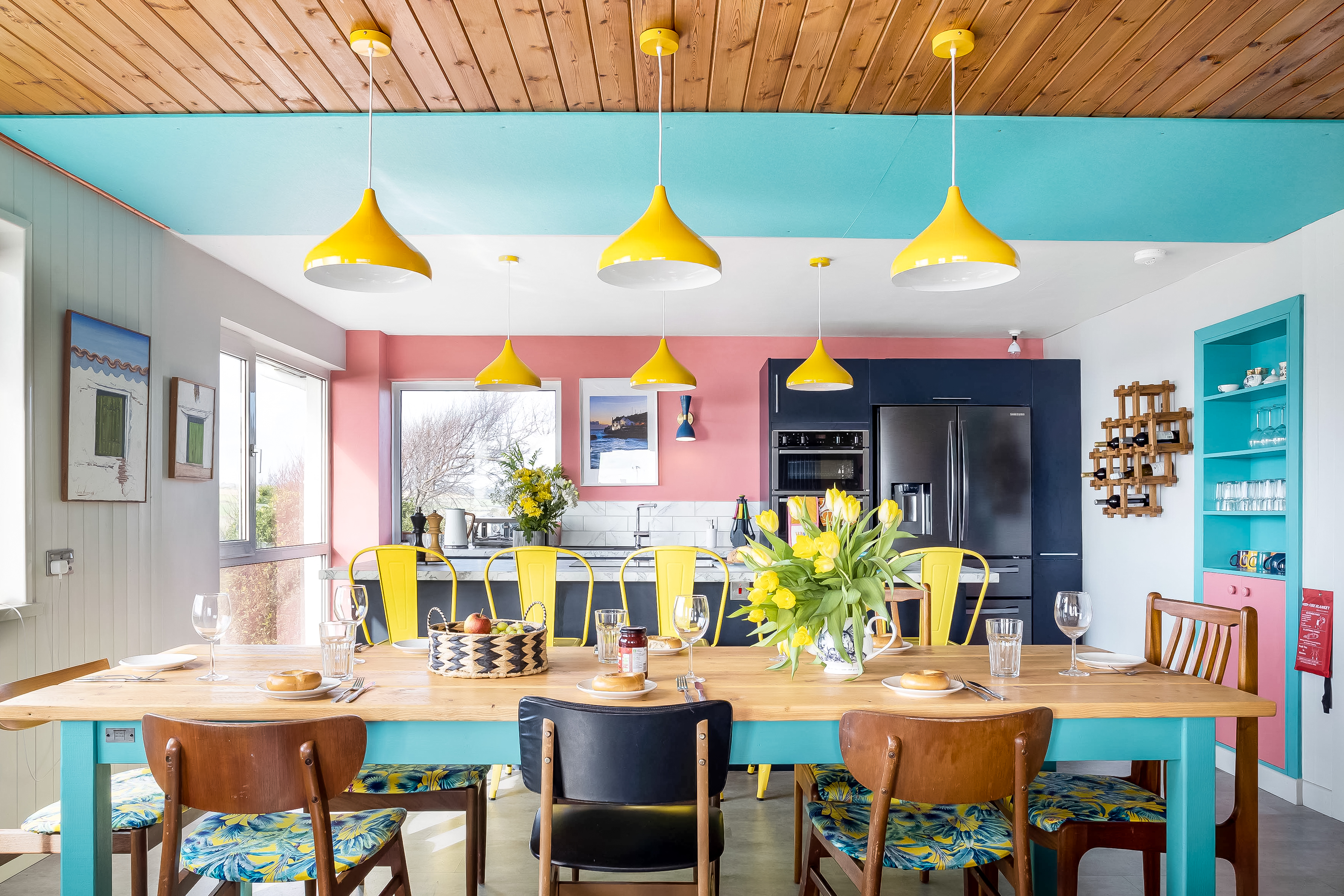 Modern kitchen with marble island and ocean views