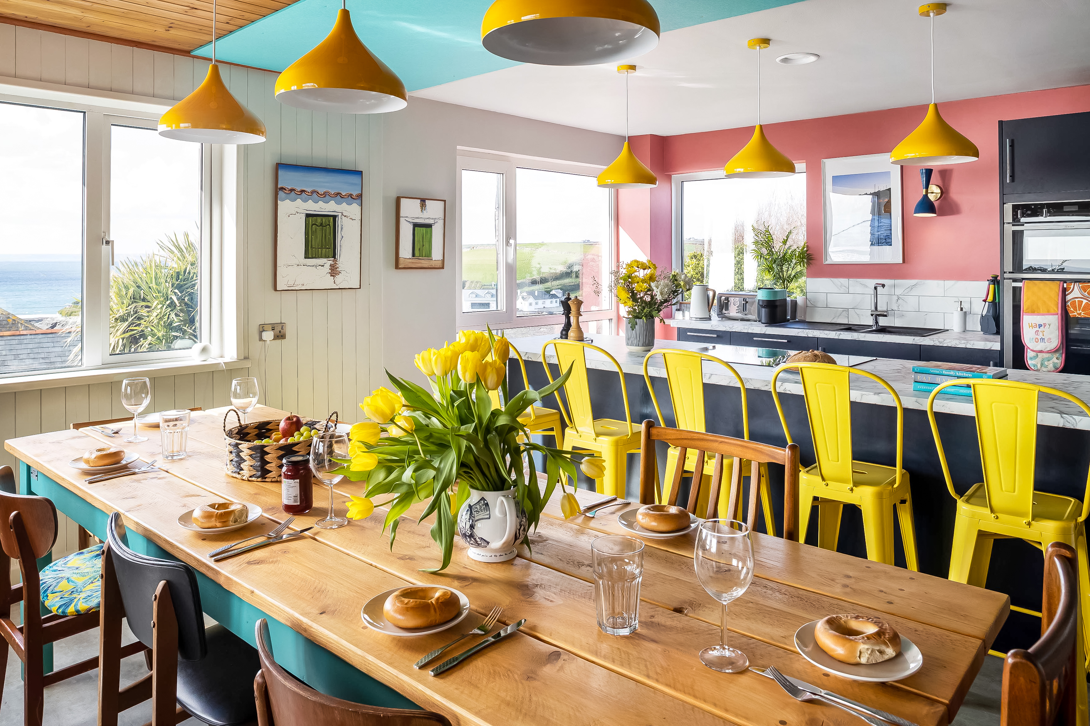 Kitchen workspace with marble countertop and pendant lighting