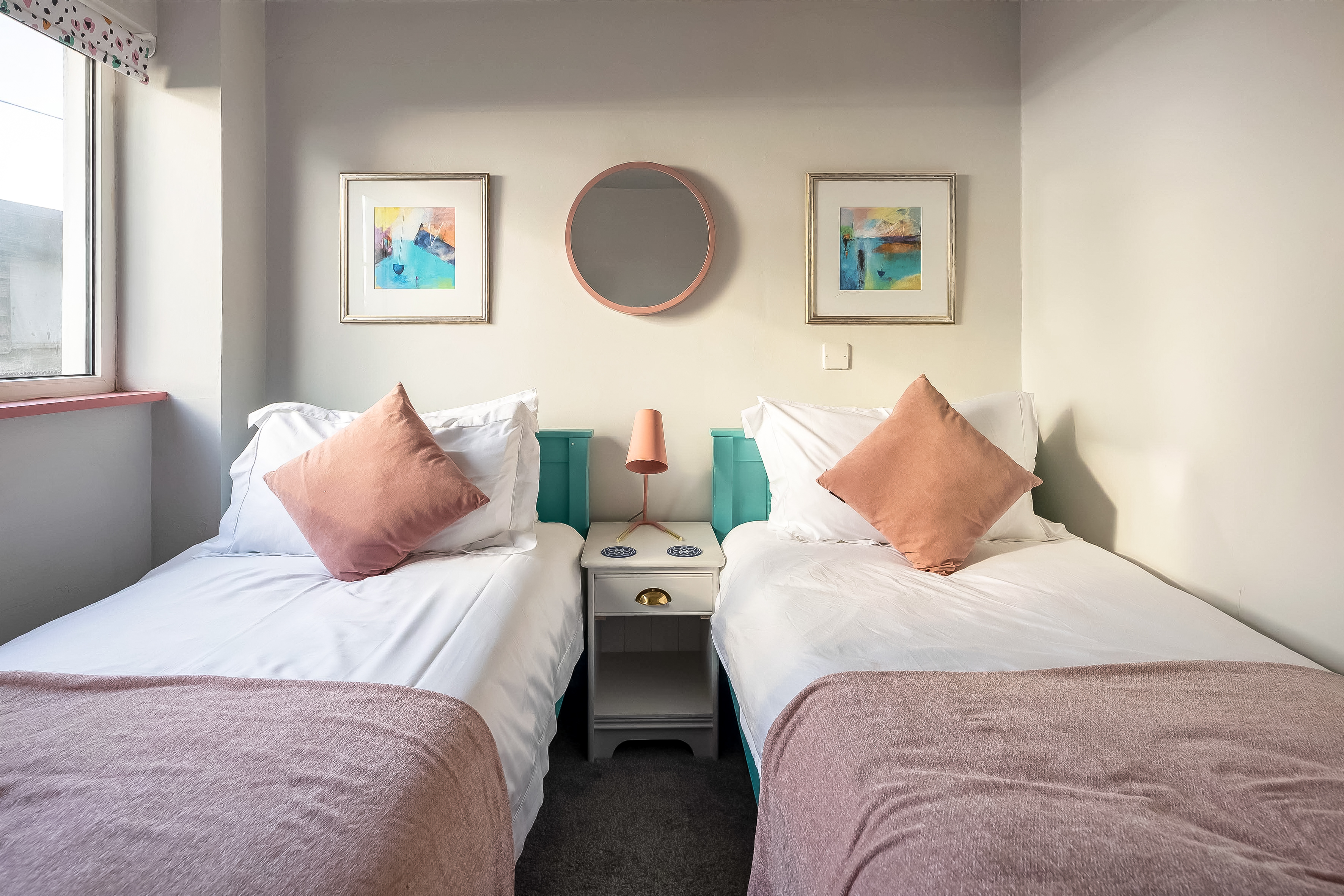 Second bedroom with matching single beds